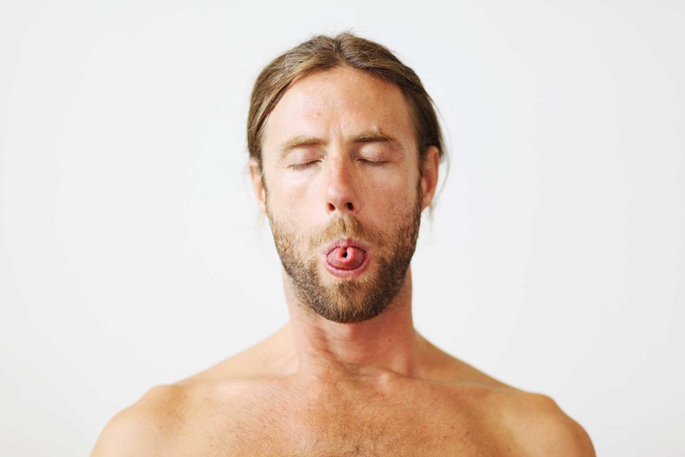 Yogis that can't roll the tongue for Sitali pranayama will do Sitkari Pranayama instead. (drawing air in through teeth) 